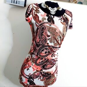 White dress with pink paisley print